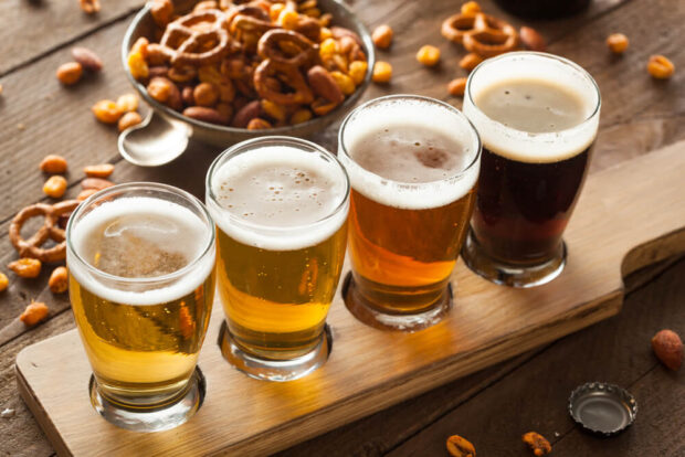 flight of beer with snacks at the breweries in Branson MO