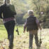 Parent and child enjoying the fall weather in Branson while fishing